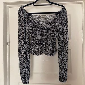 Off the shoulder floral long sleeved top